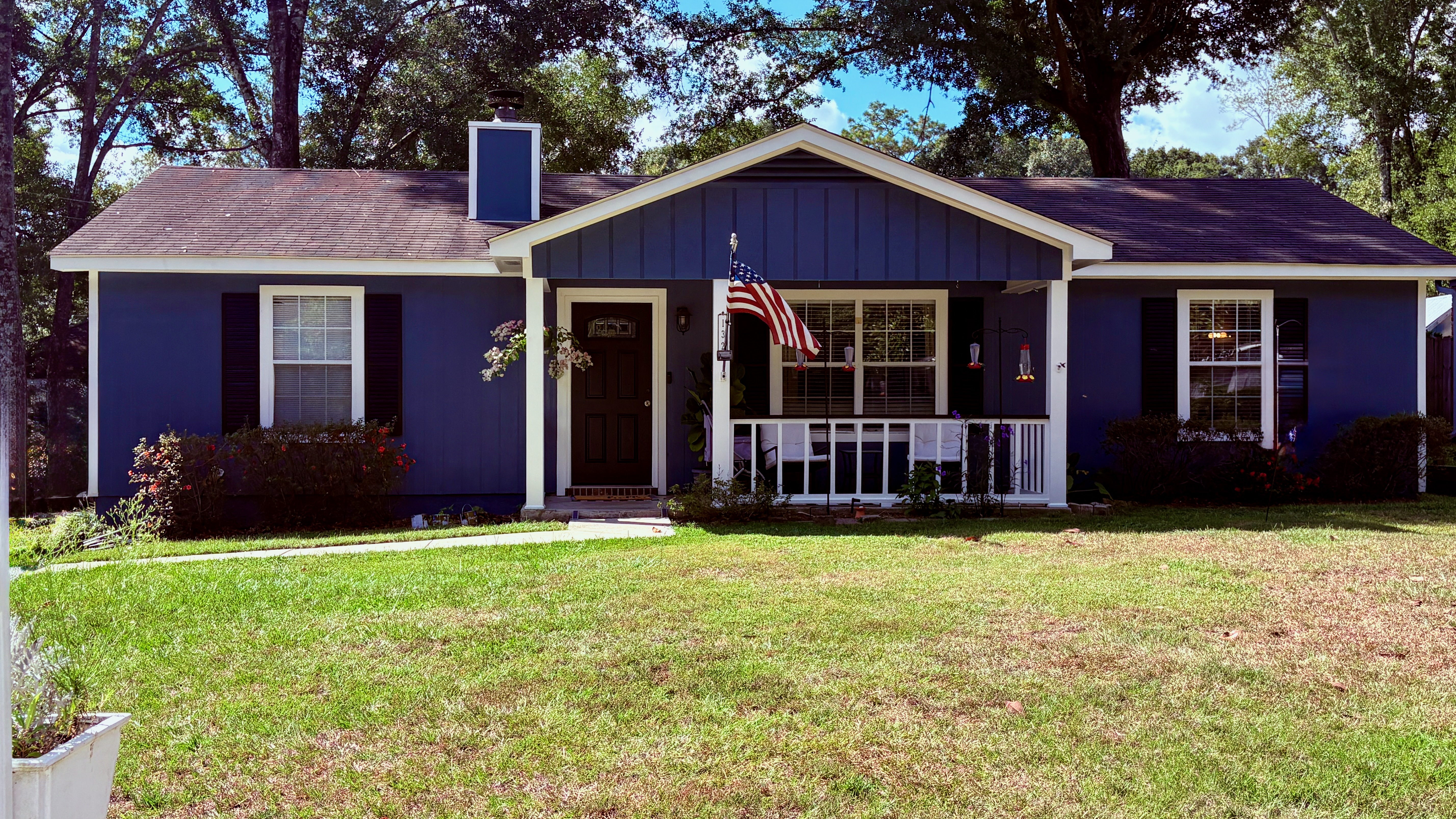 Exterior repaint of blue wood siding in Daphne, AL