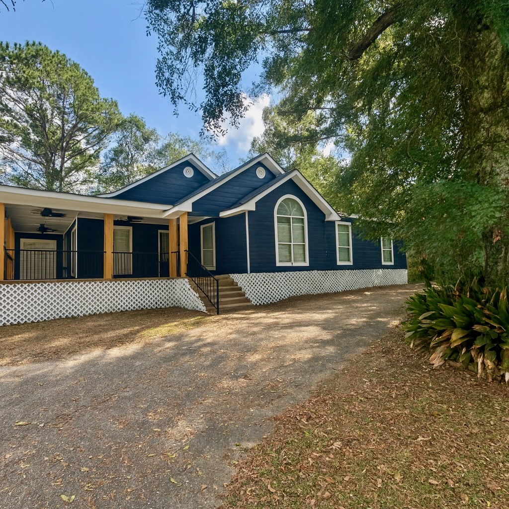 Blue wood siding repaint in Loxley